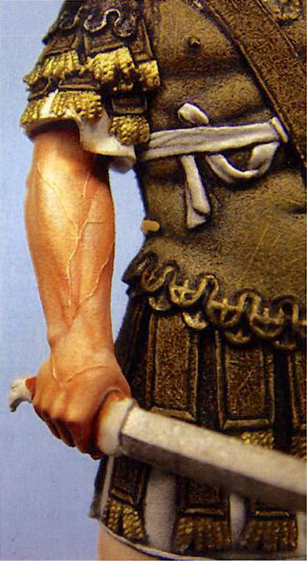 The veins on the arms are superbly rendered by the sculptor and can be emphasized by the painter - but in a subtle way. Don't overdo them!