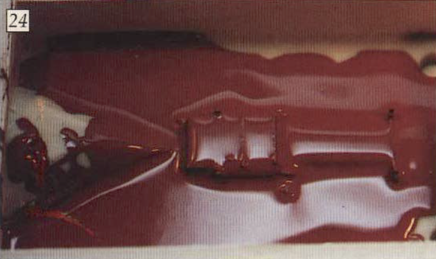 24. Definition of the component visible beneath the glossy surface of the rubber.